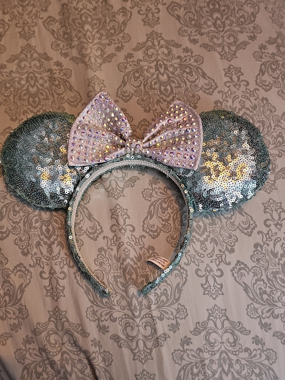 Disney Sequin Mouse Ear Headband with Iridescent Pink Bow